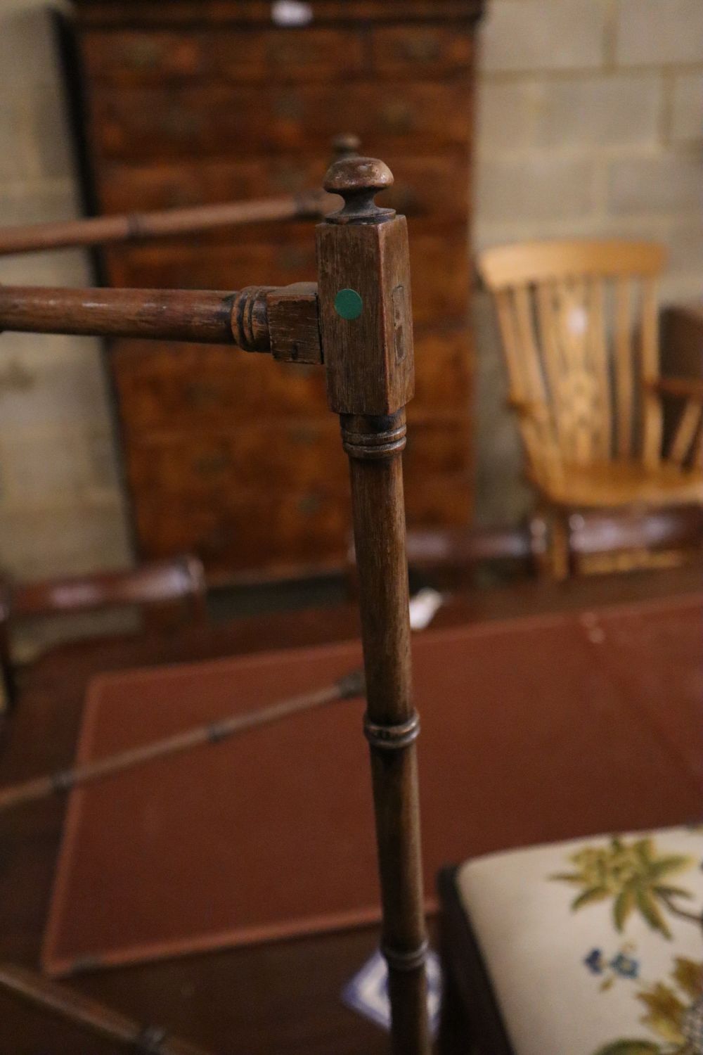 A 19th century turned mahogany folding towel rail, height 77cm